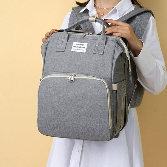 Mochila pañales plegable con cambiador