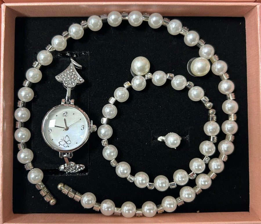 Conjunto de joyas plateado con perlas