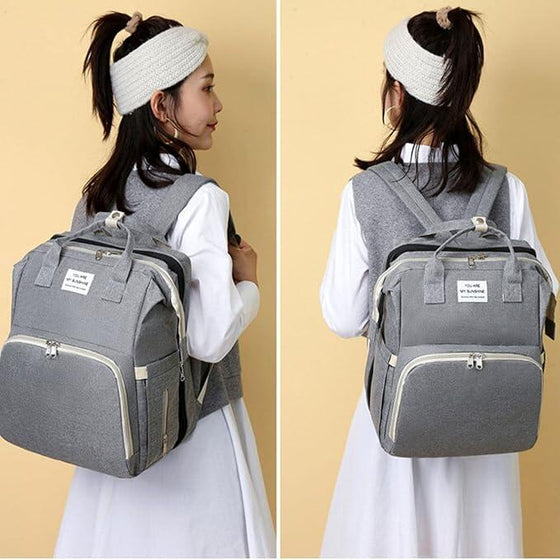 Mochila pañales plegable con cambiador